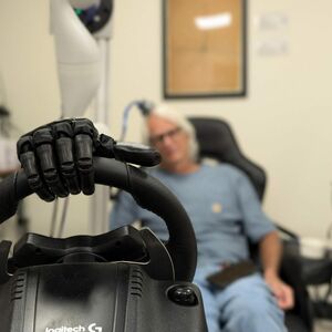 bionic hand on steering wheel