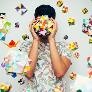 man holding puzzle